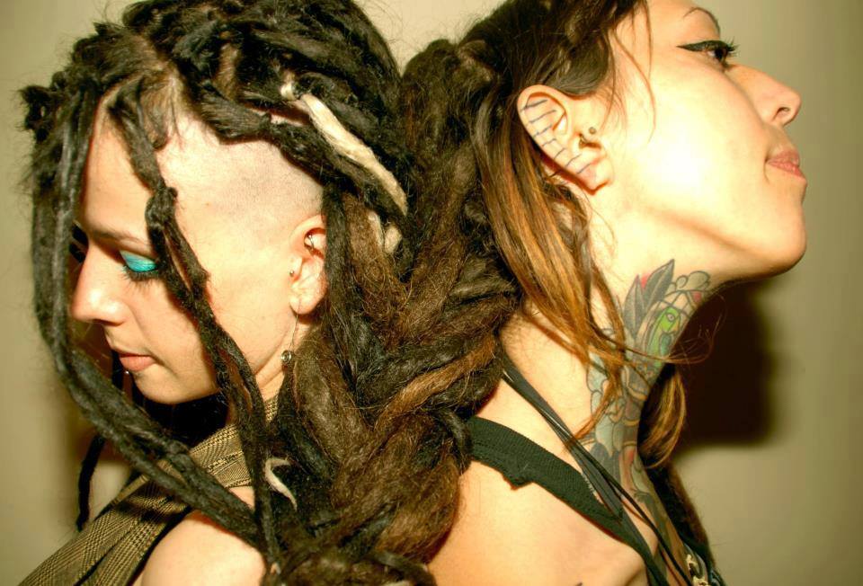 Close-up of TWO healthy, moisturized scalp between two strong dreadlocks
