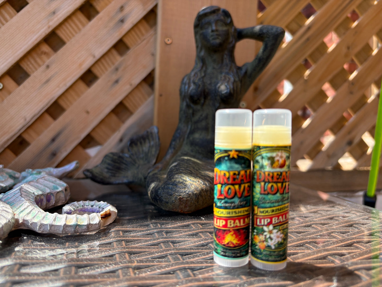Two Vegan Dread Love Nourishing Lip Balm tubes in Toasted Marshmallow and Creamsicle flavours 