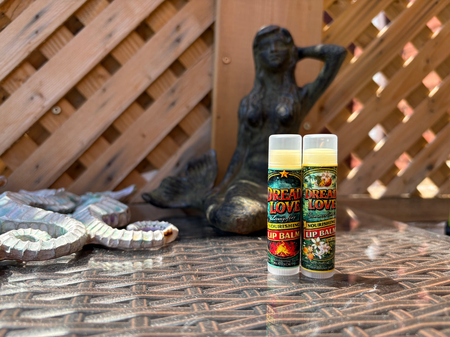  Two Dread Love Nourishing Lip Balm tubes — Toasted Marshmallow and Creamsicle — side by side 