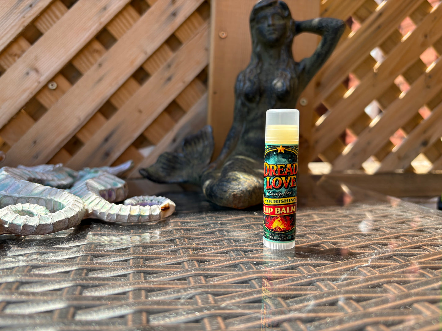  Close-up of Dread Love Toasted Marshmallow Nourishing Lip Balm tube Vegan