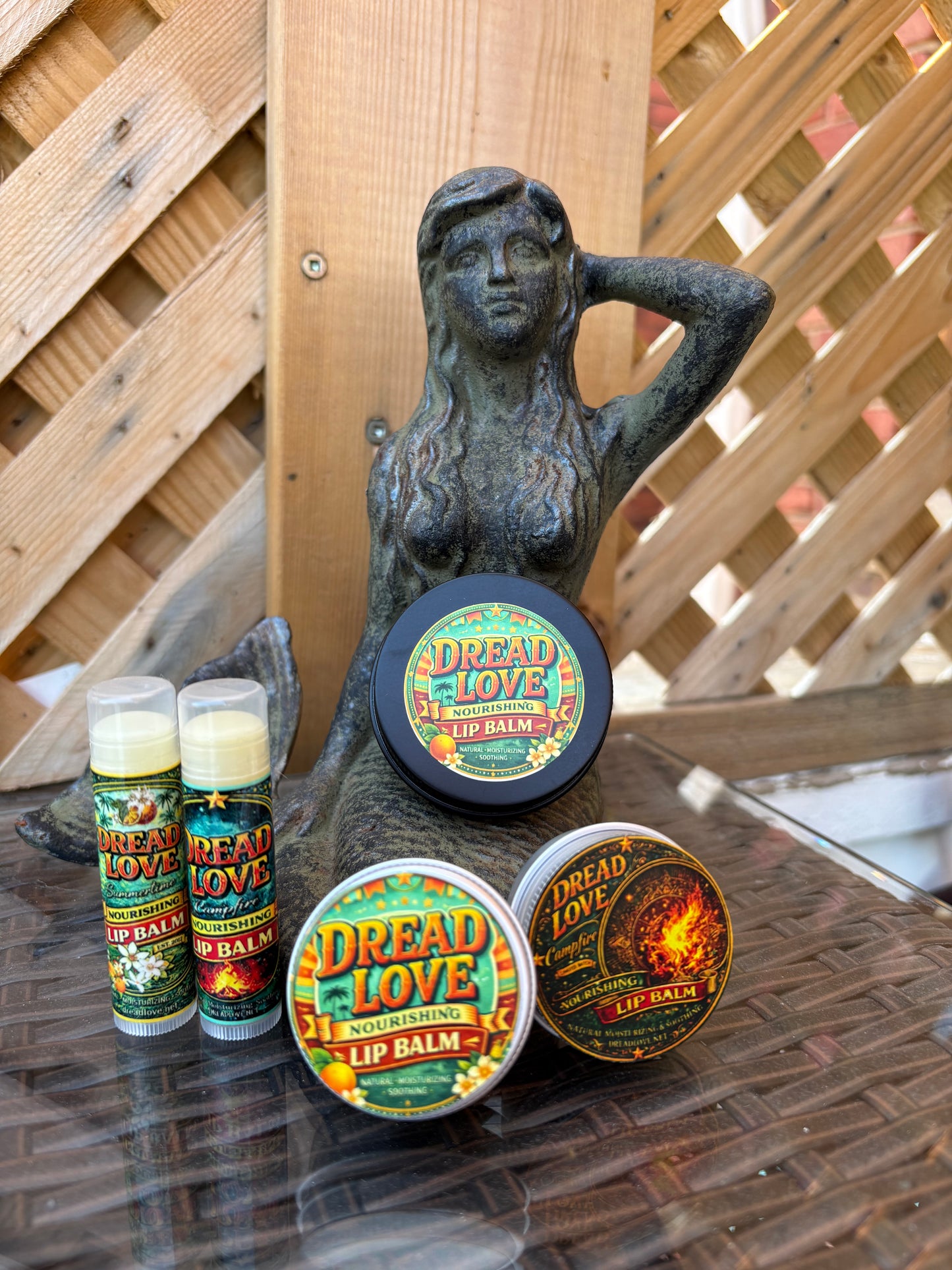 Dread Love's full collection of lip balms, two tubes, 3 tins of summertime and campfire, one tube each of summertime and campfire