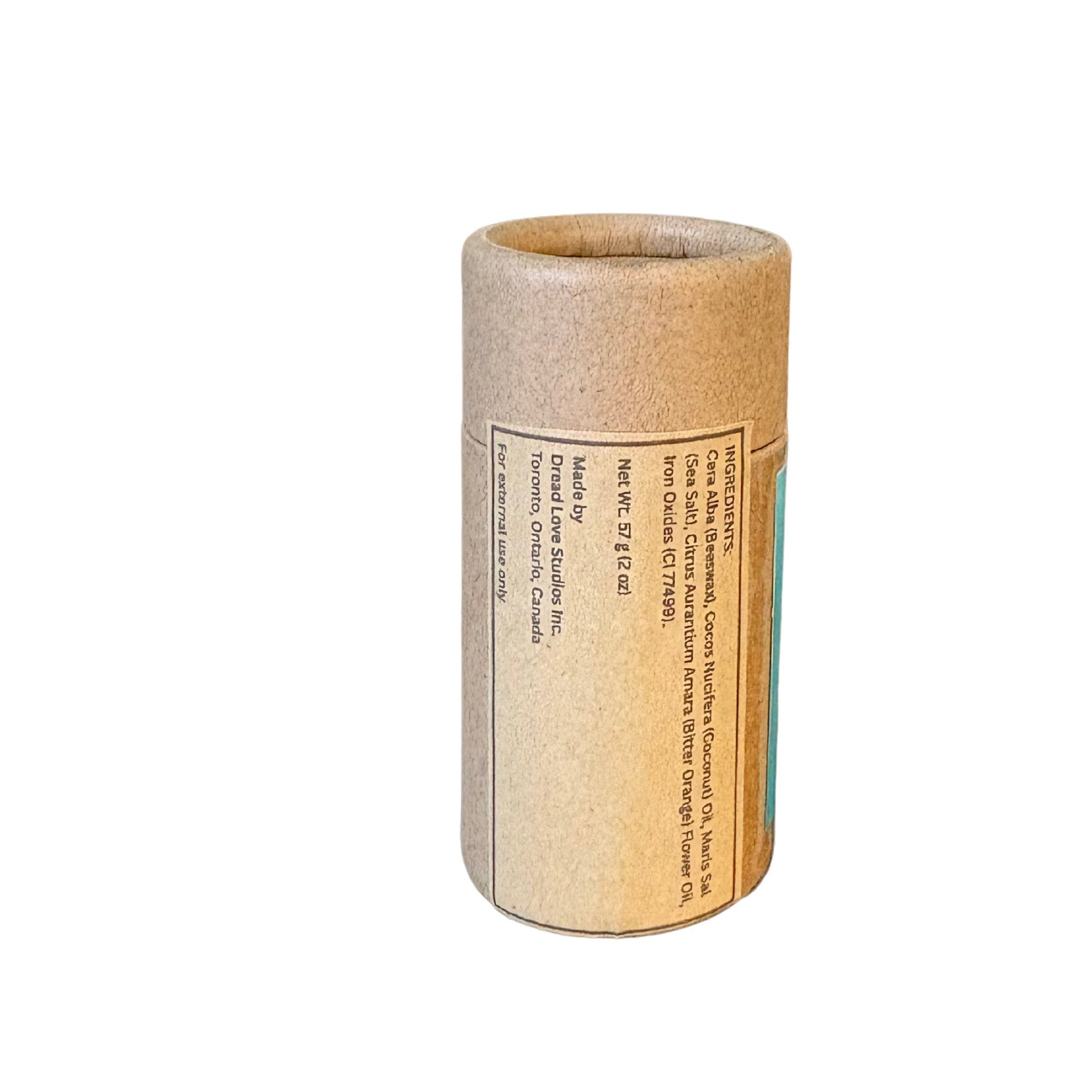 dark wax label Ingredients: Cera Alba (Beeswax),
Cocos Nucifera (Coconut) Oil,
Maris Sal (Sea Salt),
Citrus Aurantium Amara (Bitter Orange) Flower Oil,
Iron Oxides (CI 77499)
Net weight 58g (2oz)
Made by: Dread Love Studios Inc.
Toronto, Ontario, Canada
For External Use only

